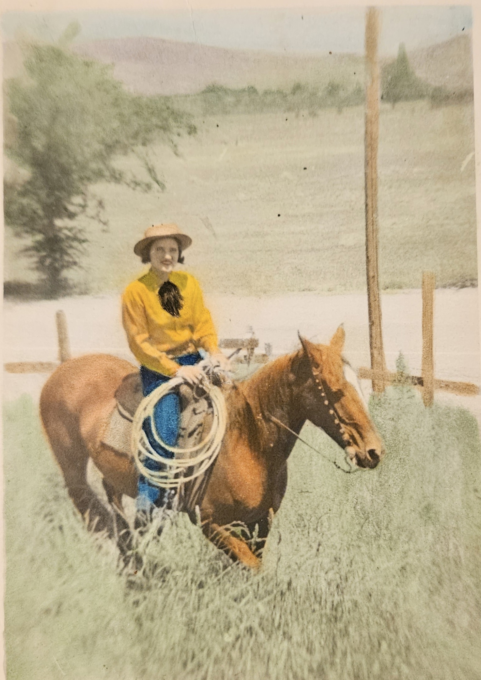 Colorized historic photo of Stella James riding her horse.